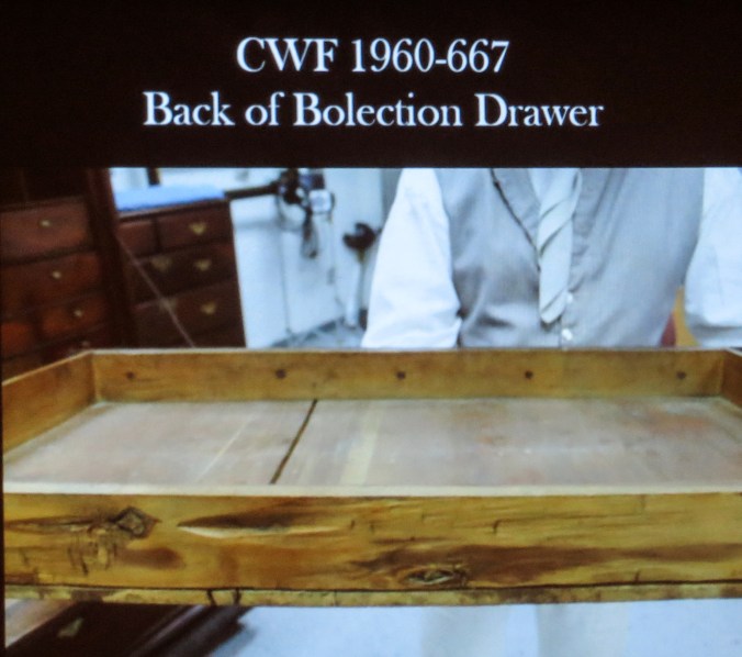 A view of the back and interior of the frieze drawer. The swelled front is nailed to the the drawer face with rose-head nails from inside.