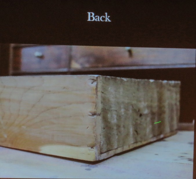 Nailing of a small interior drawer side to the back.